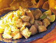 Potato chunks served in a tangy sauce and yogurt