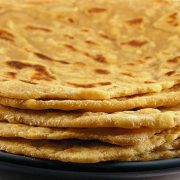 ALOO PARATHA Stuffed with spicy boiled potatoes and an onion mix