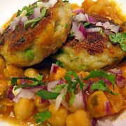 Shallow fried potato patties with onions, chillies & light masala