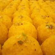 MOTI CHOOR LADDU Extraordinary sweet made of clusters of tiny capsules of sweetness, dusted with pistachio nuts, waiting to burst onto your tongue
